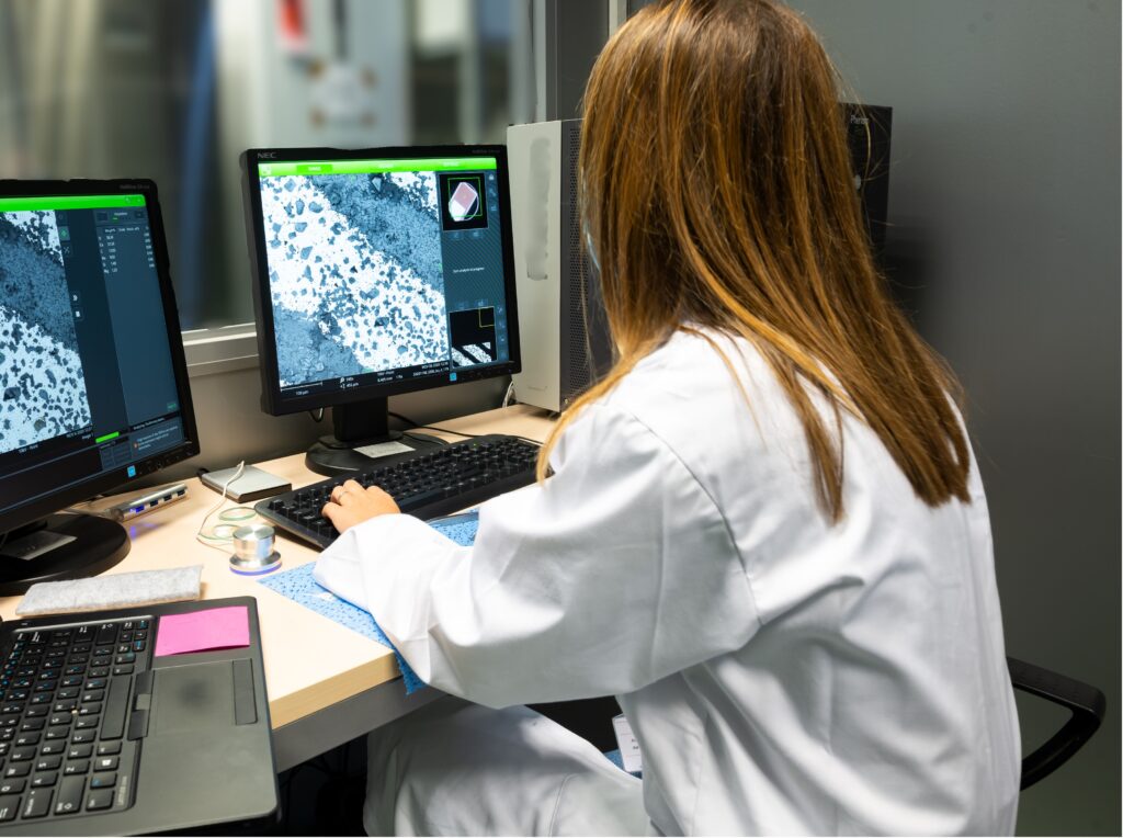 Reverse engineering and chemical analysis of heavy metals to optimize industrial waste management Laboratory technician performing chemical sample characterization
