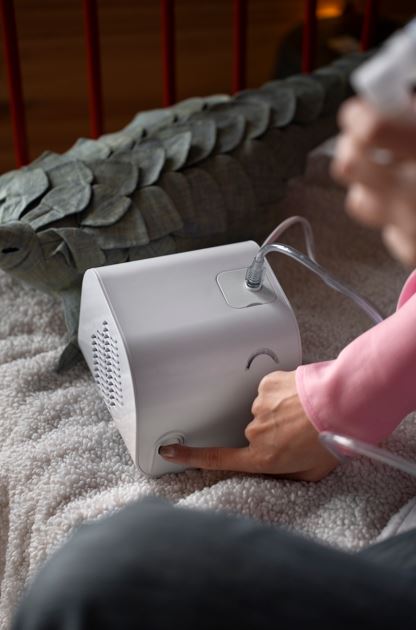 Portable ozone disinfection device used to sanitize textiles and surfaces