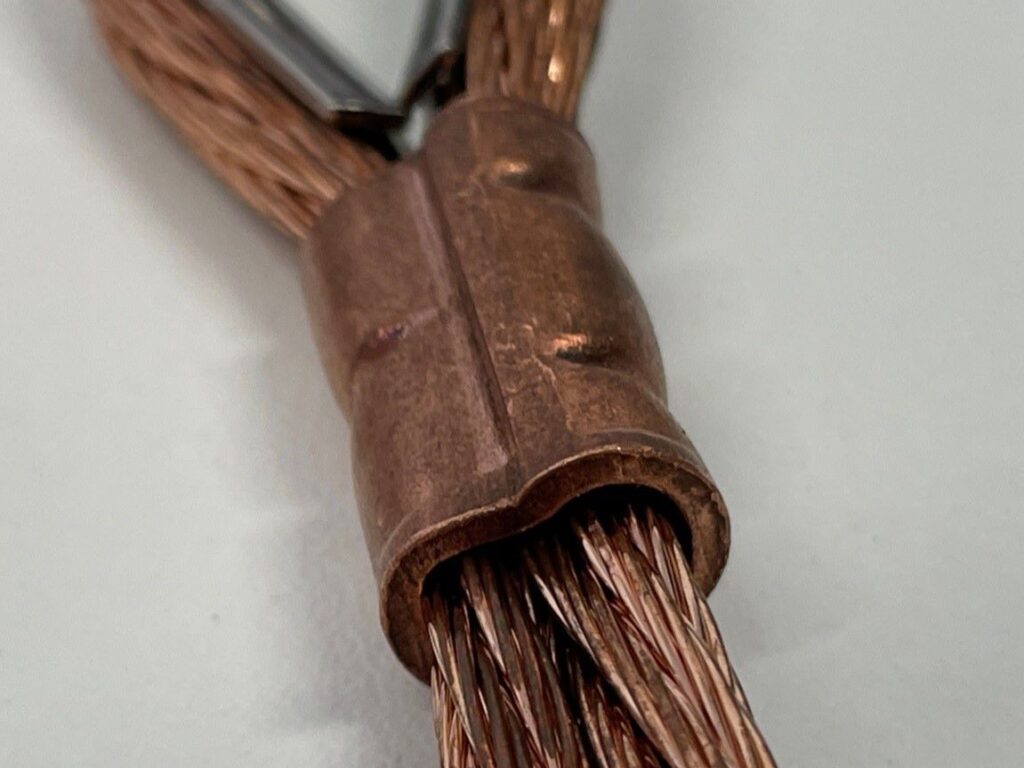 Custom test design to evaluate the elongation of electrical conductors with mechanical precision Image representing product development.